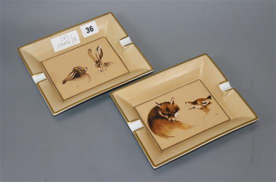 Hermes Paris. A pair of fox and hare porcelain cigar ashtrays, Monogram B.C.